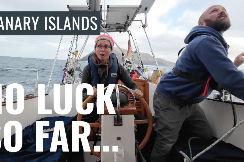 Nike and Floh sailing their boat Santana through high Atlantic swells in the Canary Islands.